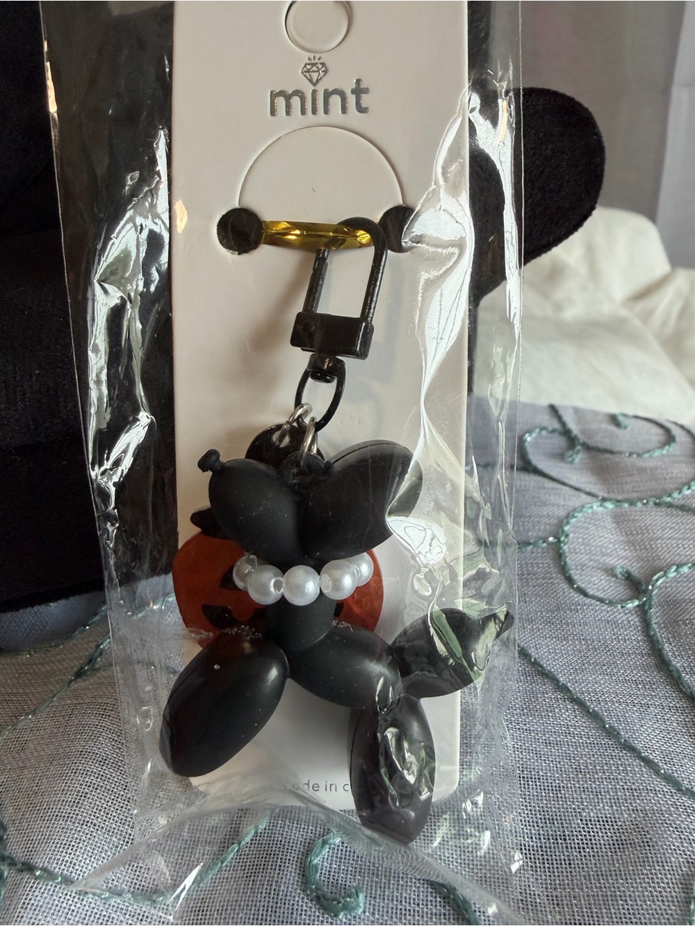 Mint Black Balloon Dog Keychain with Pearl Collar and Orange Pumpkin Charm